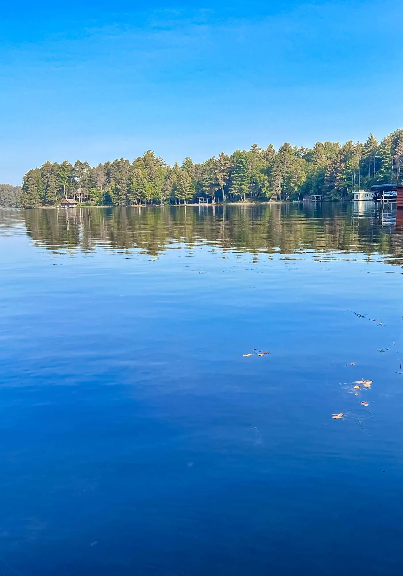 Lakefront escape on Rest Lake with dock, firepit & bike trail access