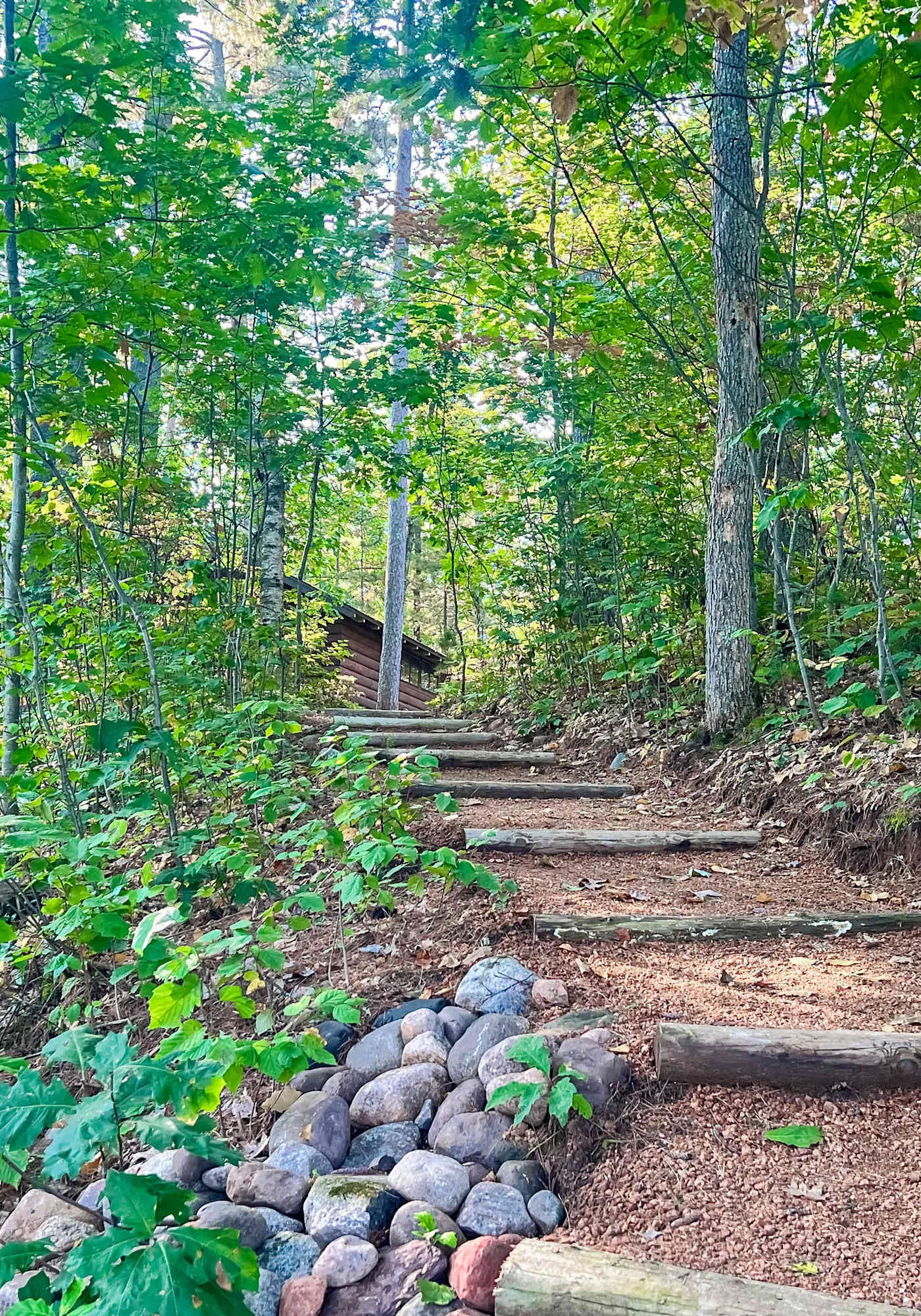 Lakefront escape on Rest Lake with dock, firepit & bike trail access