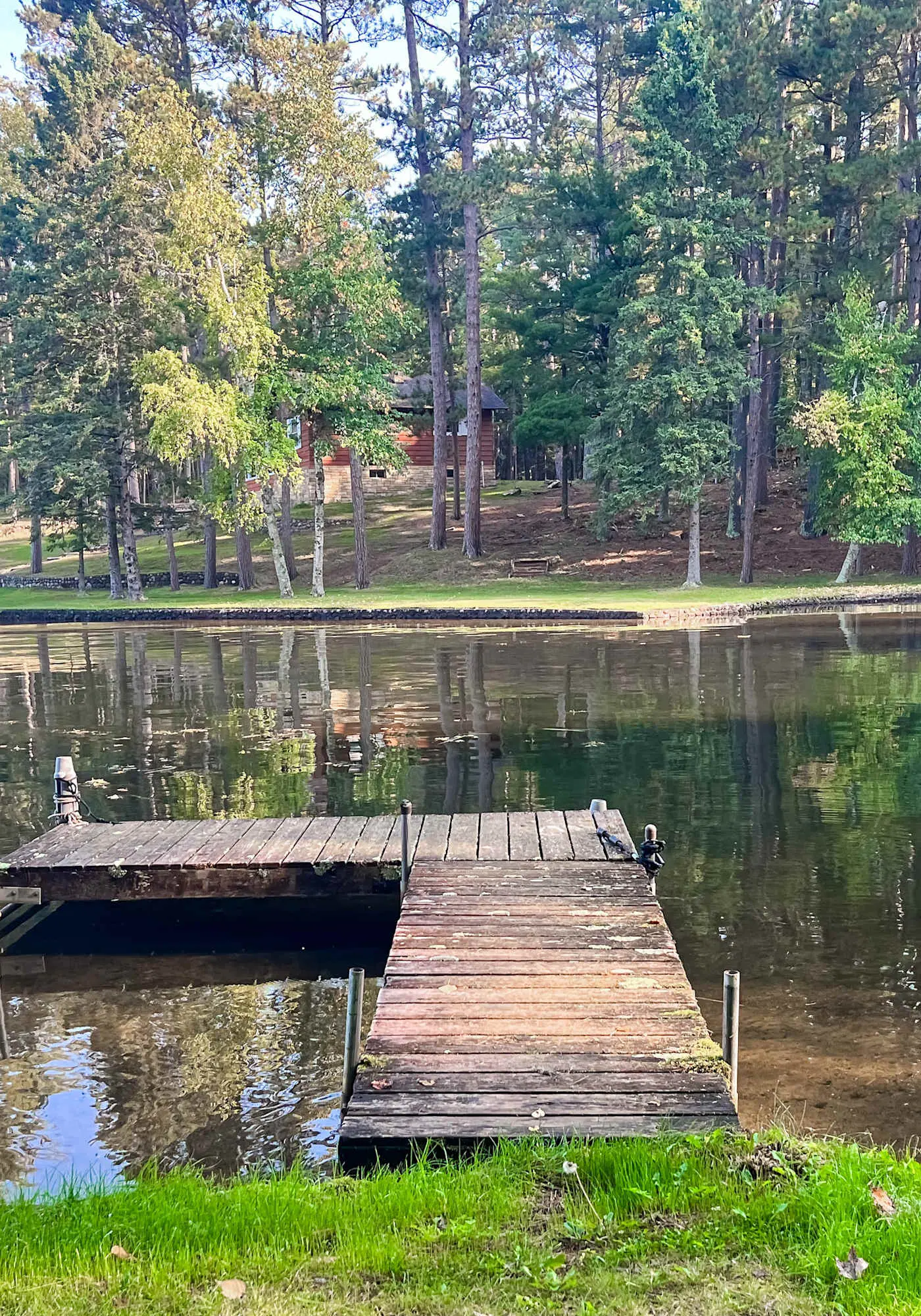 Lakefront escape on Rest Lake with dock, firepit & bike trail access