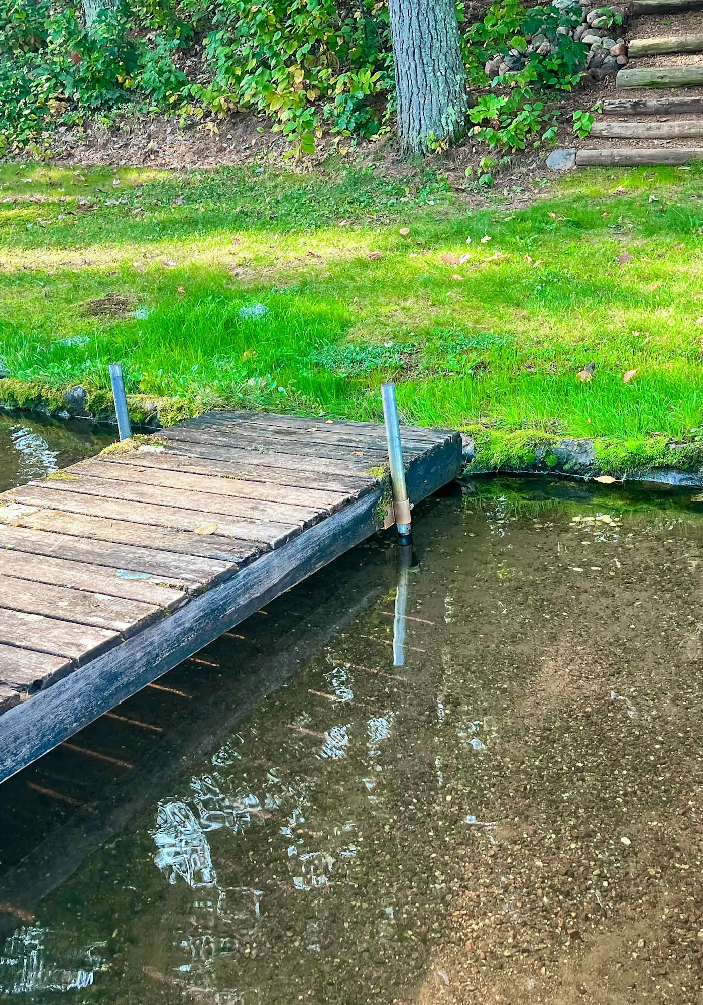 Lakefront escape on Rest Lake with dock, firepit & bike trail access