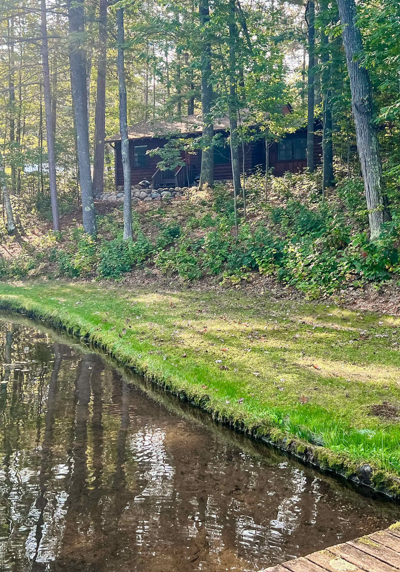 Lakefront escape on Rest Lake with dock, firepit & bike trail access