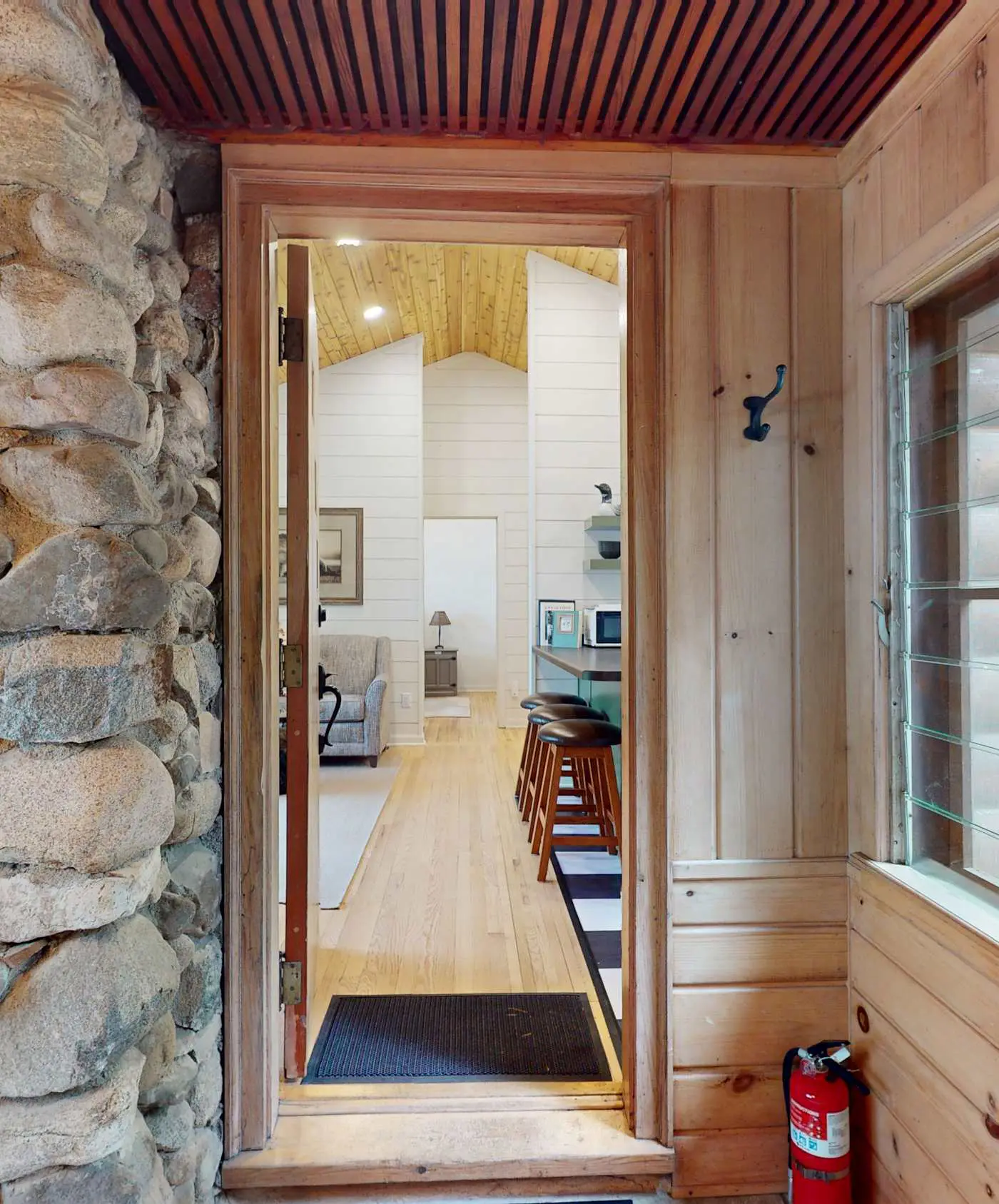 Lakefront escape on Rest Lake with dock, firepit & bike trail access