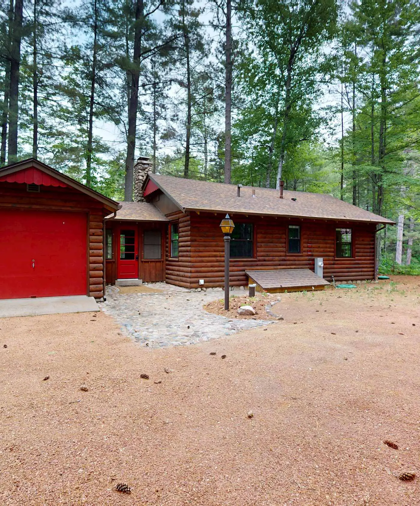 Lakefront escape on Rest Lake with dock, firepit & bike trail access