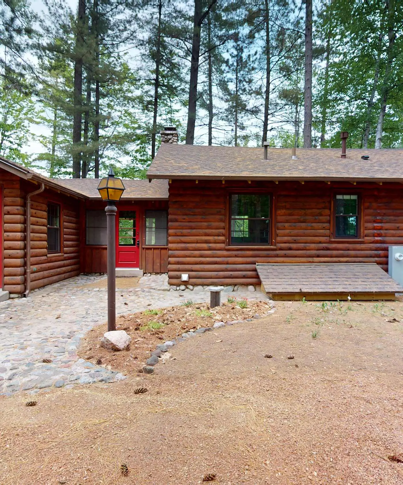 Lakefront escape on Rest Lake with dock, firepit & bike trail access
