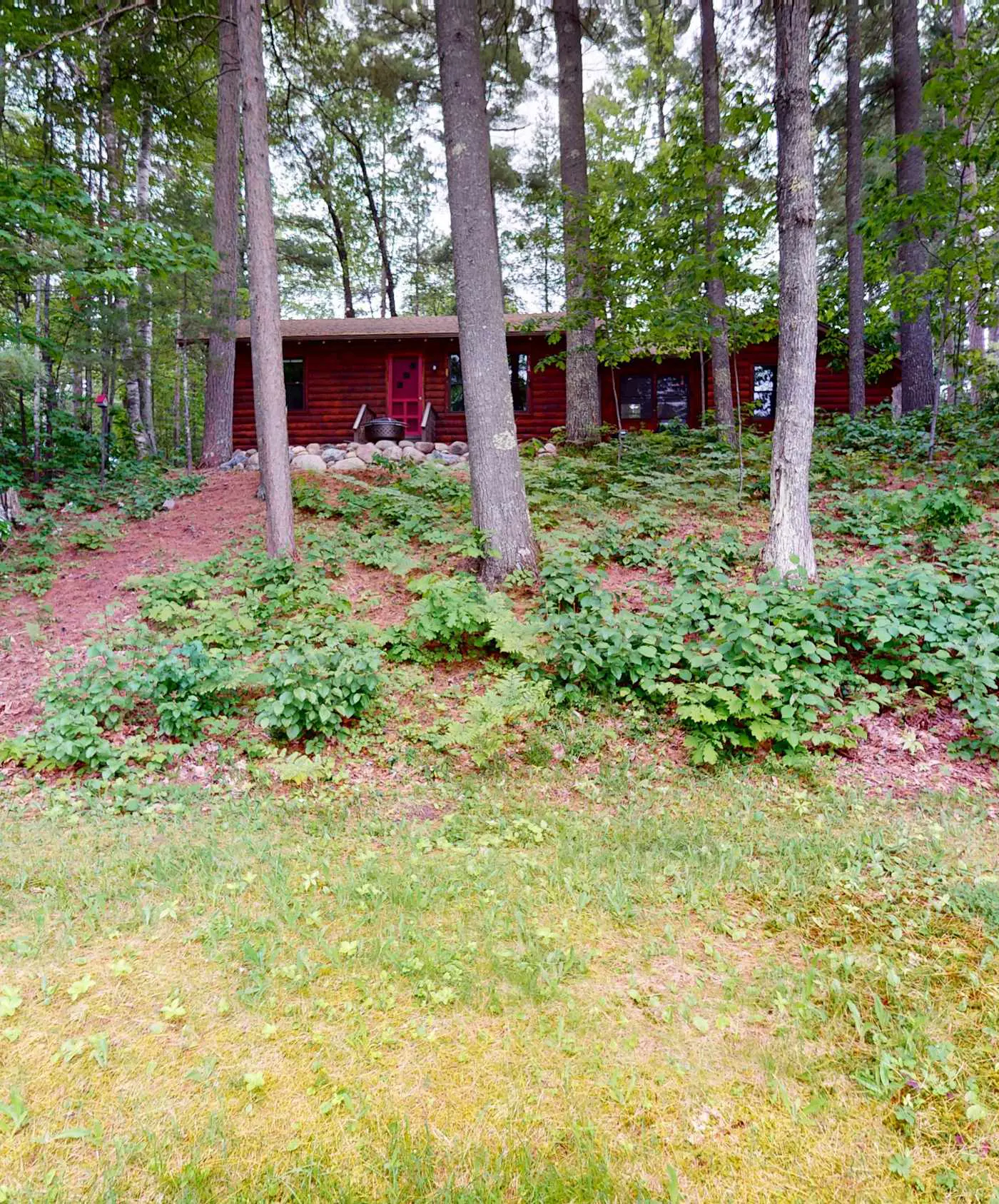 Lakefront escape on Rest Lake with dock, firepit & bike trail access