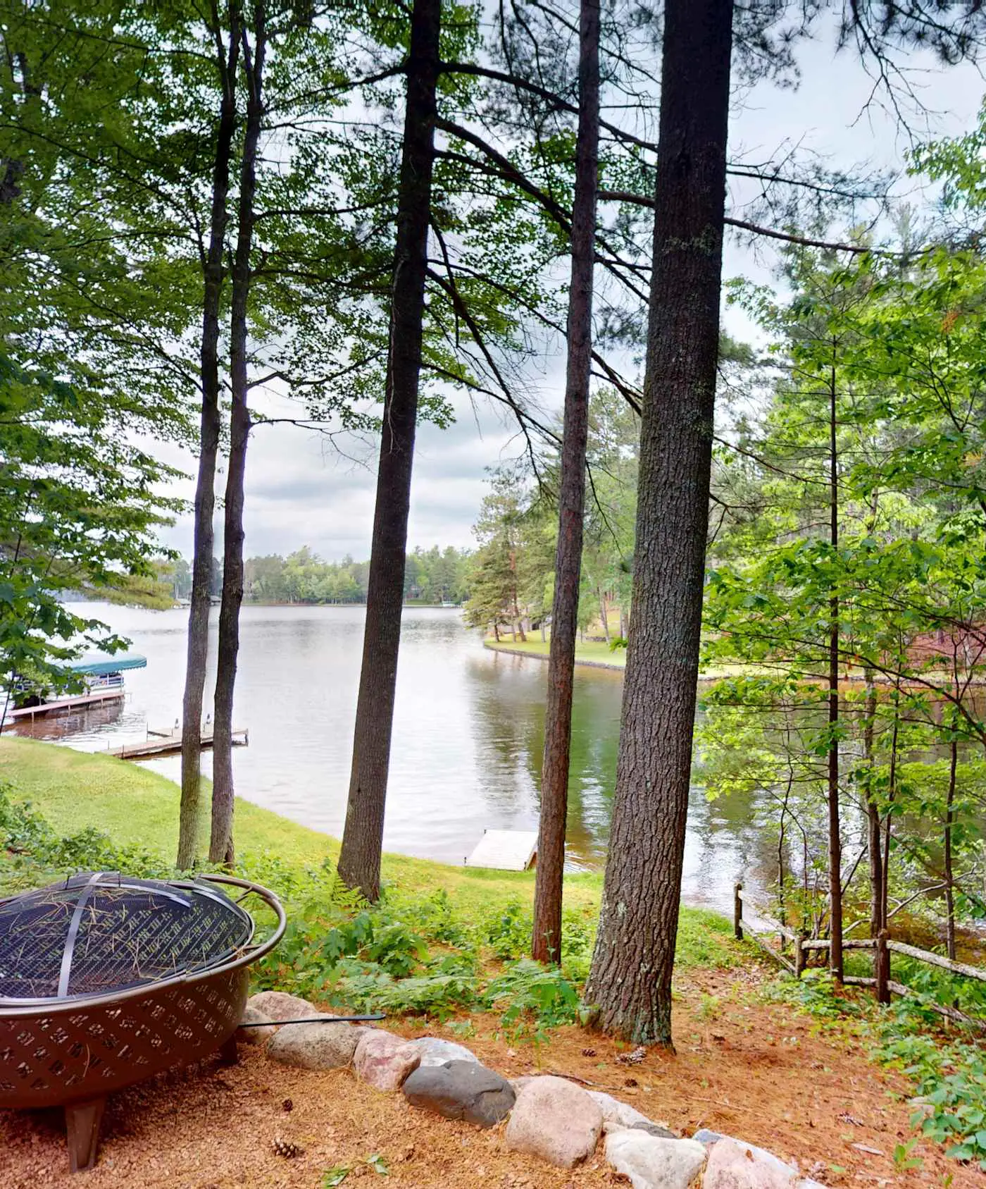 Lakefront escape on Rest Lake with dock, firepit & bike trail access