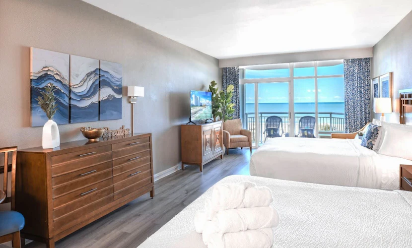Take a look at this one of a kind oceanfront studio located on the third floor of the Dunes Village Resort. This beautifully refreshed space features two comfortable queen sized beds and can easily accommodate up to four guests, making it a perfect choice for your next beach escape. As of Spring 2026, the condo has been updated with fresh finishes and thoughtful upgrades, creating a bright and inviting atmosphere we are excited to share.