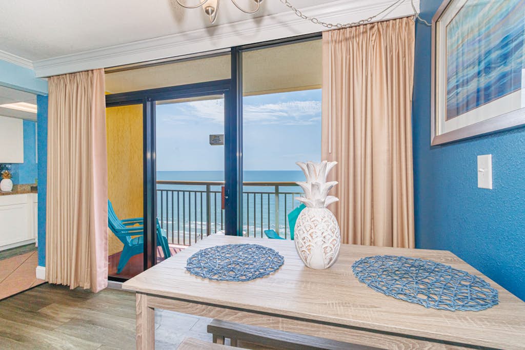Located at the Caravelle Resort in Myrtle Beach, this condo offers a breathtaking view of the Atlantic Ocean. This penthouse suite has a spacious and unique floor plan that sets it apart from all other condos at this resort. Guests can enjoy the luxury of a fully stocked kitchen, making it convenient for cooking small meals. The layout is perfect and fully furnished, featuring 1 king bed and a Murphy bed (a hidden wall bed). This arrangement will comfortably accommodate a total of 4 guests!