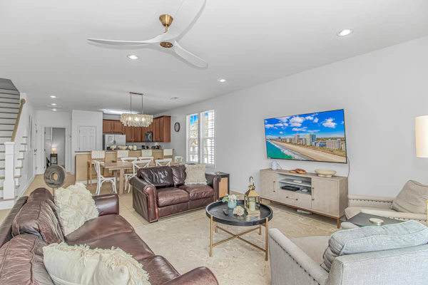 Welcome to Changes In Attitude, a beautiful five-bedroom, three-and-a-half-bath coastal retreat located in Surfside Beach. True to its name, this relaxing beach home is the perfect place to leave your worries behind and embrace vacation mode. With plenty of room for family and friends, the home comfortably accommodates up to 11 guests, making it ideal for group getaways, family vacations, or beach celebrations. Dogs are welcome so your furry family members can join the adventure, though we kindly ask that pets weigh 50 pounds or less. Please note that cats are not permitted. The home features updated bedrooms and a newly renovated patio, offering comfortable spaces to relax after a day at the beach. Whether you're gathering together, enjoying the fresh coastal air outside, or simply unwinding with loved ones, Changes In Attitude is designed to help you create lasting vacation memories.