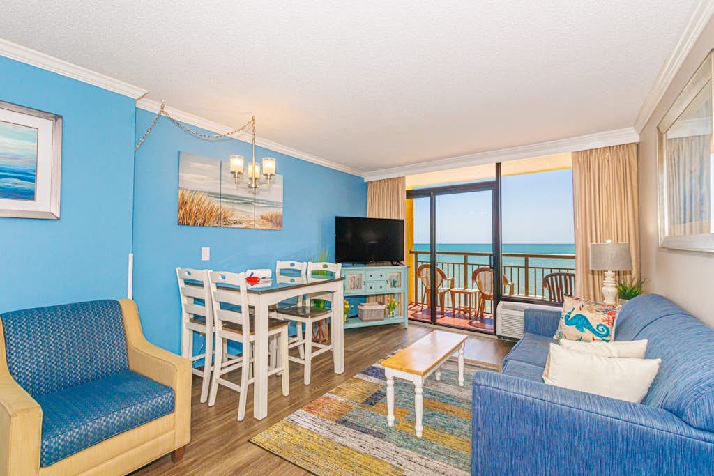 Welcome to your Atlantic escape! Located on the 10th floor of the iconic Caravelle Resort, where the oceanfront views are absolutely outstanding, this fully refreshed 1-bedroom condo pairs panoramic, postcard-level vistas with all the modern essentials travelers actually want. Whether you're chasing an epic sunrise from your private balcony, working remotely with high-speed Wi-Fi, or waking up to walk right out of the building directly onto the sand, this is your perfect coastal landing pad.

​The space features updated, modern coastal furnishings, crisp decor, and upgraded Roku Smart TVs in both the bedroom and the living room so you can stream all your favorite shows. With 2 double beds and a double-size pull-down Murphy bed, it comfortably accommodates families, couples, or small groups of up to 6 guests without feeling crowded.