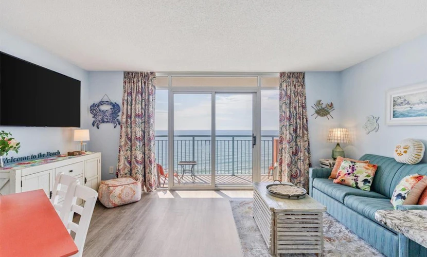 Check out this beautifully updated tenth floor oceanfront condo for four at Roxanne Towers. This bright and stylish retreat features a king sized bed and a queen murphy bed, offering all the comforts of home with the added luxury of being right on the ocean. With modern touches throughout and views that stretch endlessly across the shoreline, this getaway is the perfect setting for your next beach vacation.