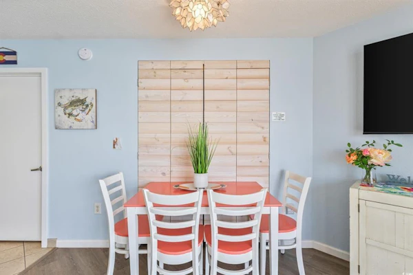 Check out this beautifully updated tenth floor oceanfront condo for four at Roxanne Towers. This bright and stylish retreat features a king sized bed and a queen murphy bed, offering all the comforts of home with the added luxury of being right on the ocean. With modern touches throughout and views that stretch endlessly across the shoreline, this getaway is the perfect setting for your next beach vacation.