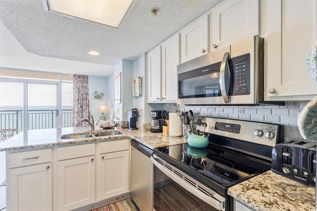 Check out this beautifully updated tenth floor oceanfront condo for four at Roxanne Towers. This bright and stylish retreat features a king sized bed and a queen murphy bed, offering all the comforts of home with the added luxury of being right on the ocean. With modern touches throughout and views that stretch endlessly across the shoreline, this getaway is the perfect setting for your next beach vacation.