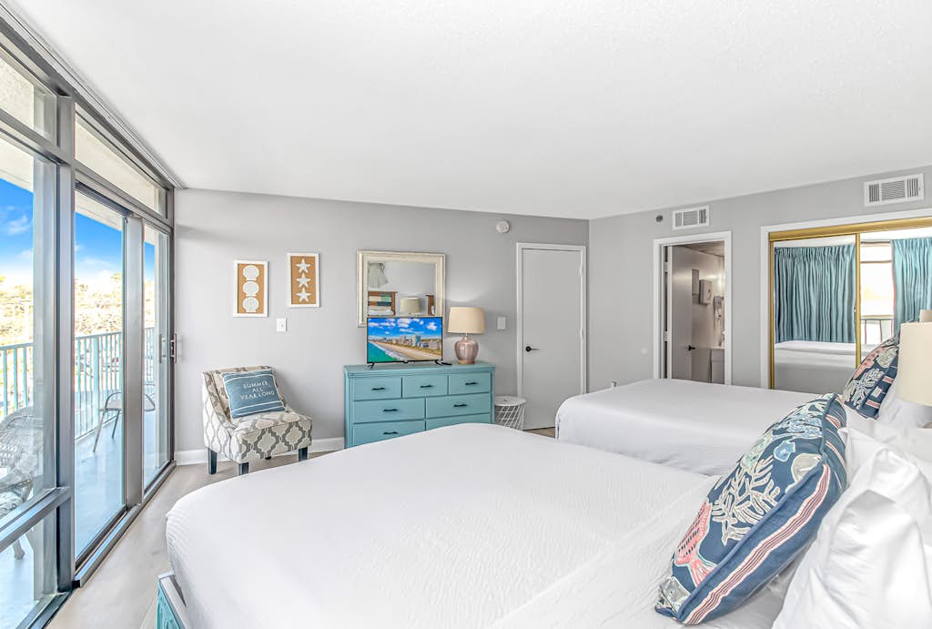 If you are looking for your next vacation spot in Myrtle Beach, SC, the search ends here! You will be blown away by this recently renovated, spacious 2-bedroom condo, located at the highly sought-after complex of Sand Dunes Resort in Myrtle Beach, SC. This ocean view condo features 2 queen size beds, 2 full size beds and will comfortably accommodate up to 8 guests! Guests will have access to multiple dressers and closets for storage, TV in each room, complimentary Wi-Fi, 2 private bathrooms, vanity, and a fully functioning kitchen. In addition to the cozy, coastal decor, this condo has its own private balcony with partial ocean views!


Important Notice: Balcony Railing Coating Project

The Balcony Railing Coating Project will be underway for approximately 6&ndash;8 weeks (weather permitting), with completion expected by mid to late January.

During this period, signage will be placed on sliding glass doors to inform guests when balcony work is taking place. Please remind guests not to touch the railings, as they will be in various stages of coating and drying.

Please note:

Balcony access will be restricted only while work is being performed on that specific stack.