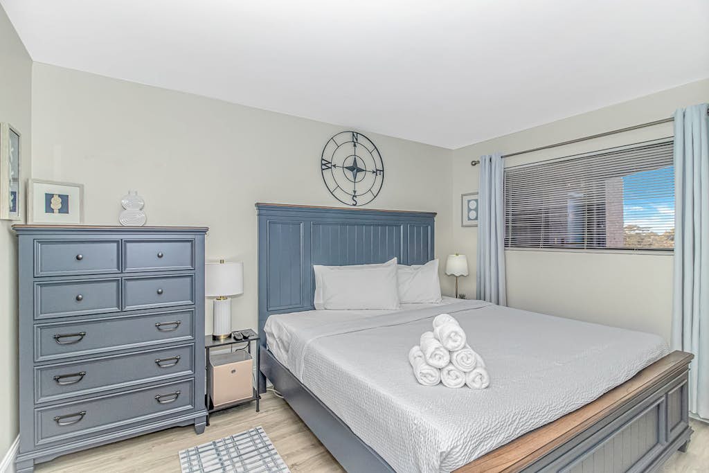 Welcome to your coastal escape at Ocean Villas, a beautifully renovated city-view condo where modern style and seaside living come together. Located on the 5th floor and completed in Winter 2025, this fully updated 2-bedroom, 2-bath retreat is just a short walk from the beach and offers the perfect setting for families, friends, or small groups to unwind and create lasting memories. The condo comfortably sleeps up to six guests, featuring a king-size bed in the primary suite, a full bed in the second bedroom, and a queen sleeper sofa in the living area.