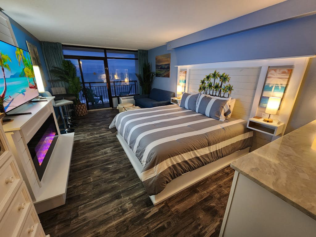 The search for your next vacation stops here! Check out this 8th floor, direct oceanfront condo at the Landmark Resort in Myrtle Beach. This condo is fully furnished with 1 king bed, 1 full sized sleeper sofa, and will comfortably accommodate 4 guests. Our guests enjoy having their own private balcony where they can relax and enjoy the views of the ocean.