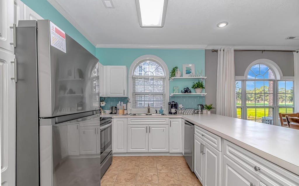 This beautiful 2-bedroom condo at Magnolia Place is situated on the first floor and offers lovely views of the golf course right from your private patio. With a full kitchen, two bathrooms, and two comfortable bedrooms, the space is perfectly suited for up to four guests to relax and enjoy their stay.
