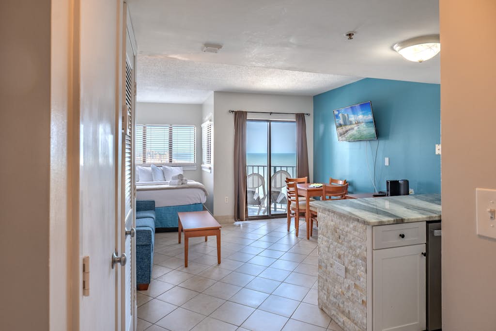 This incredible suite delivers stunning northern facing views of the Atlantic and a stay that truly stands out. If you have been searching for the perfect beach getaway, this is it. Welcome to this beautifully updated 22nd floor ocean view one bedroom condo, thoughtfully designed to comfortably accommodate up to 4 guests with a layout that feels both open and functional.