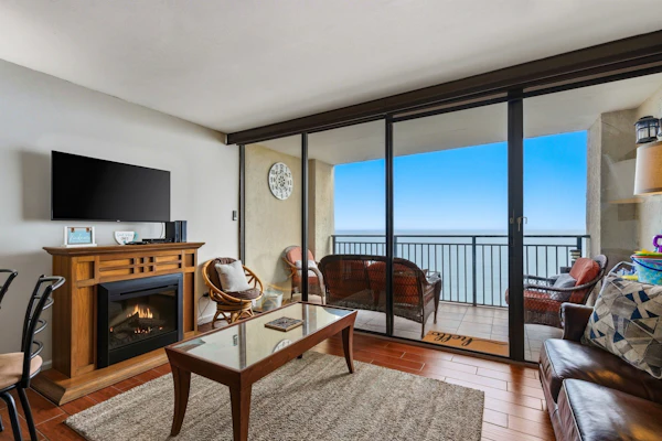 Step into a serene escape where every detail is designed for relaxation and comfort. This stunning 1-bedroom, 1-bathroom oceanfront condo at Ocean Forest Plaza offers breathtaking views that stretch across the horizon and can be enjoyed from nearly every corner of the space. With a full floor-to-ceiling glass wall in the living room, the sliding doors open onto your private balcony, inviting the soothing sounds of the waves and the fresh ocean breeze inside.
