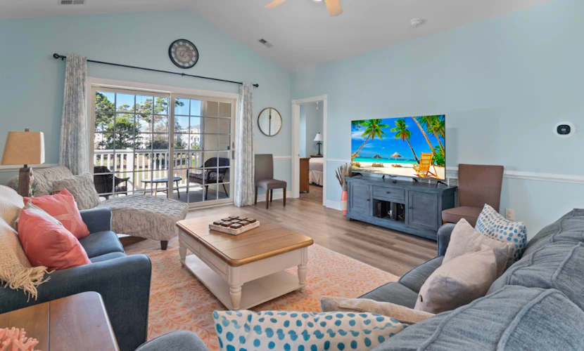 The search for your next vacation stops here! Check out this top floor condo at 4809 Magnolia Pointe in Myrtle Beach. This 3 bedroom condo is fully furnished with 2 twins, 1 full, 1 king bed, 1 sleeper sofa and will comfortably accommodate 8 guests. This condo offers a spacious living area with a couch, love seat, accent chair, TV with Roku, coffee table, and great views of the golf course from the private balcony right off the living area.