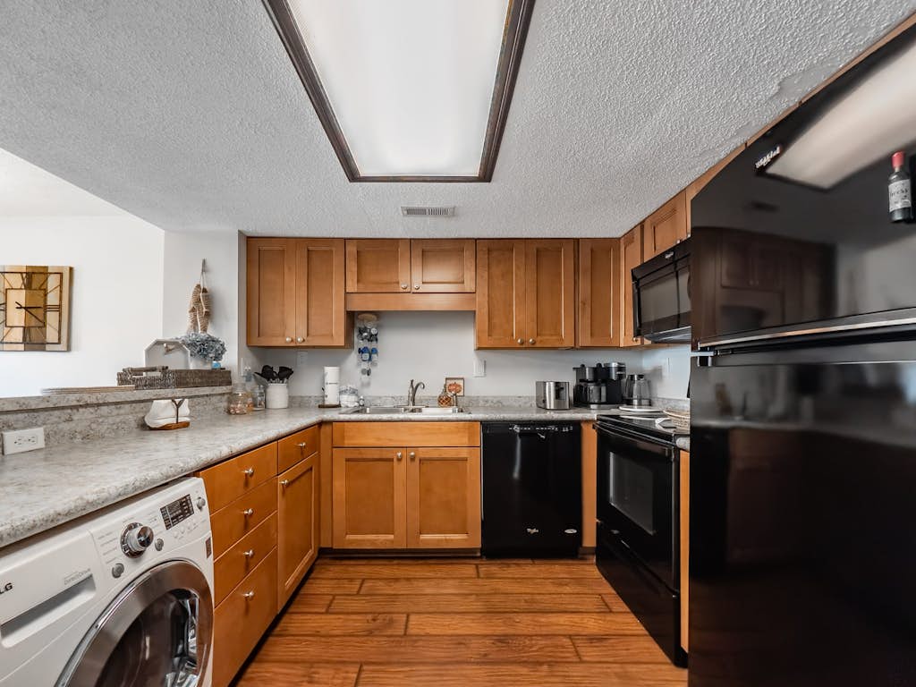 Take a look at this charming three bedroom two bath condo just a few blocks from the ocean in the perfectly situated Sea Mark Tower. Warm, inviting, and thoughtfully designed, this one of a kind space offers a king bed, a queen bed, and a twin sized sleeper sofa so up to five guests can settle in comfortably and enjoy a relaxing stay.