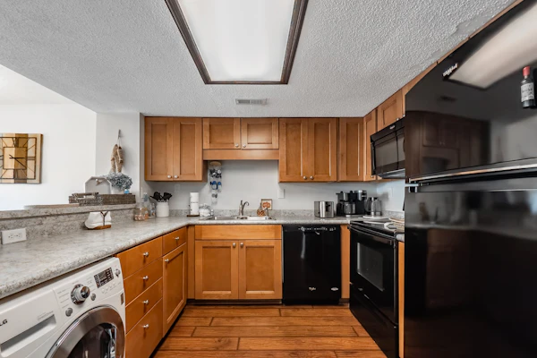 Take a look at this charming three bedroom two bath condo just a few blocks from the ocean in the perfectly situated Sea Mark Tower. Warm, inviting, and thoughtfully designed, this one of a kind space offers a king bed, a queen bed, and a twin sized sleeper sofa so up to five guests can settle in comfortably and enjoy a relaxing stay.