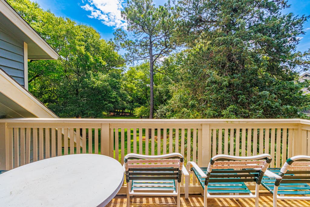 Welcome to our bright, beautifully maintained 2-bedroom, 2-bath condo tucked away in the tranquil St. James Place section of Kingston Plantation. This second-floor retreat offers a warm and inviting space that feels like a true home away from home, just a quick 5-minute stroll from the sandy shores. Step out onto the private balcony that overlooks a peaceful terrace. This is an ideal spot to sip your morning coffee, unwind with a good book, or relax after a sun-soaked day by the ocean. With a thoughtful layout and flexible sleeping arrangements, this condo comfortably hosts up to 8 guests, featuring a king-sized bed, queen-sized bed, twin trundle (twin on top and a pull-out twin below), and a sleeper sofa.