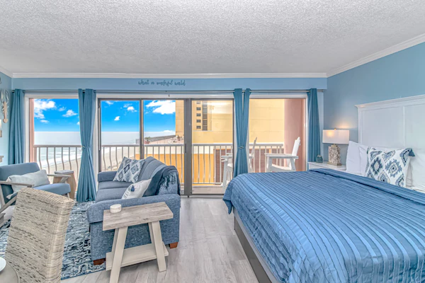 Discover your next getaway at this stunning oceanfront one bedroom at The Caravelle Resort in the landmark, St. Clements building. The historic "Pink Building" has a most unique shape offering a wide open floor plan with stunning views from the floor to ceiling windows and your private 19' balcony where the sunsets are a favorite. Through out you will enjoy a crisp clean, newly furnished space designed for relaxing and enjoying "The Golden Mile", the best Myrtle Beach has to offer.