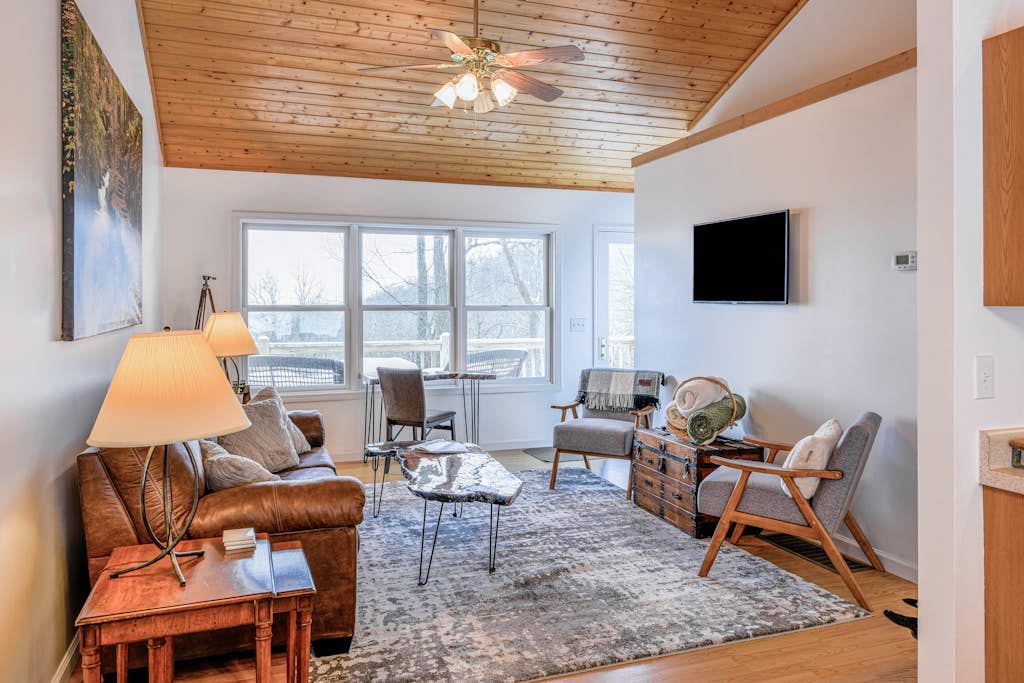 Elevated mountain-view cabin with private hot tub, 2 decks, firepit, & grill