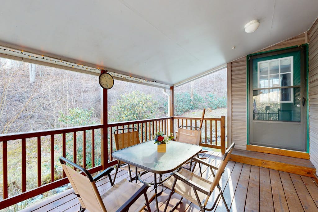 Mountain view home with a fireplace with beautiful view of the creek