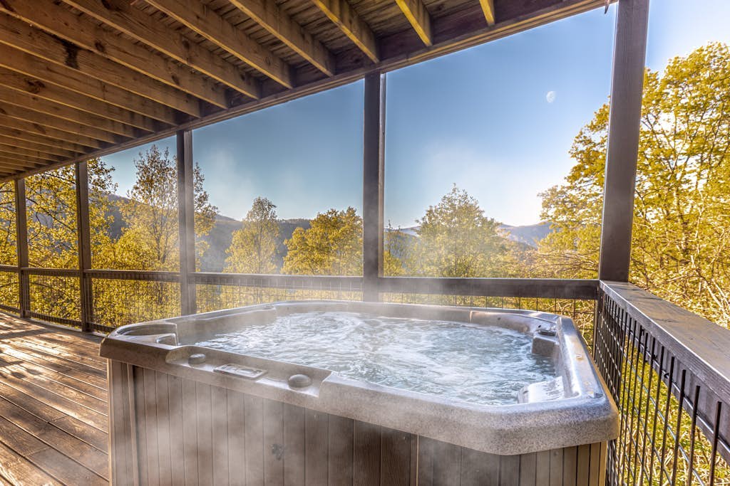 Secluded, dog-friendly mountain-view cabin with hot tub & two fireplaces
