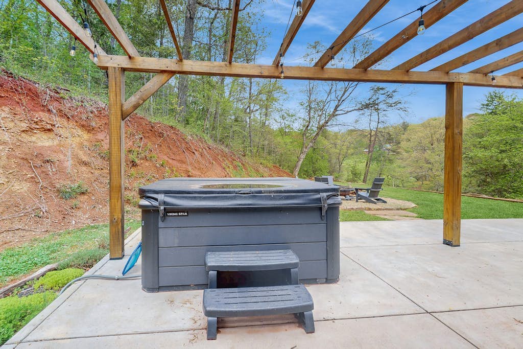 Mountain view home with a large patio and private hot tub | fire-pit | gas grill