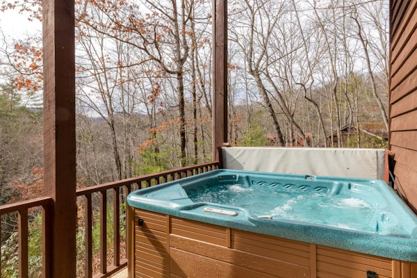 Dog-friend mtn home near pond with private hot tub, fireplace, decks, & firepit