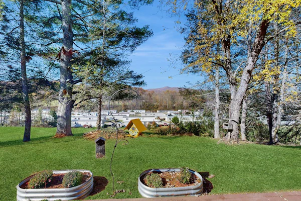 Centrally located home in Sylva with mountain views & cozy porch