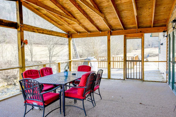Creek-side home with private hot tub, game room, firepit, deck & mountain view