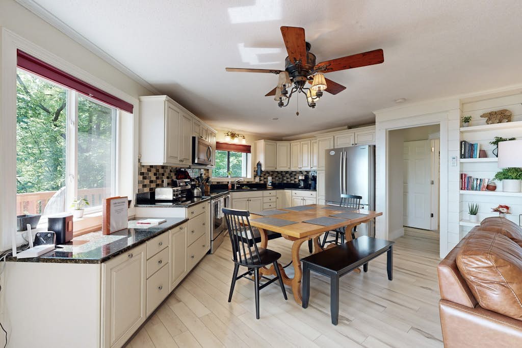 Mountain- & lake-view home with wraparound deck, firepit, & W/D - near dining