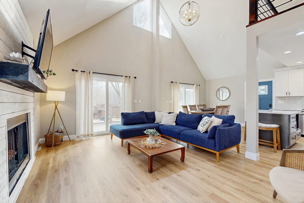 Dog-friendly home with deck, gas fireplace, central AC, & washer/dryer