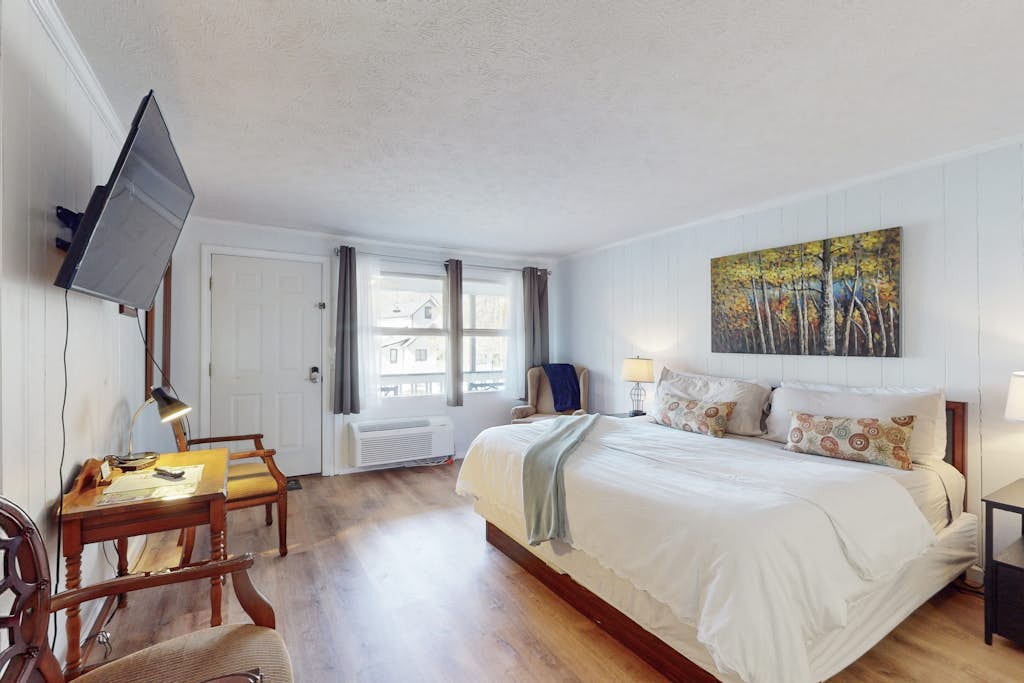 Dog-friendly lakefront condo with pool, canoes, & WiFi - in a perfect location