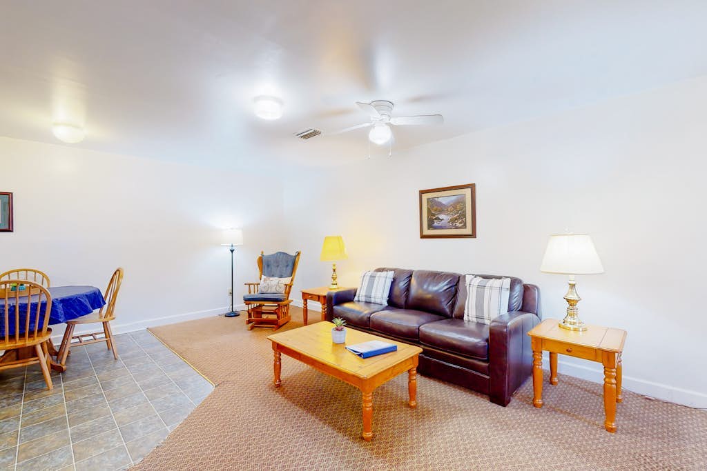 Quaint condo across from the lake with shared lakeside pool and trails - dogs OK