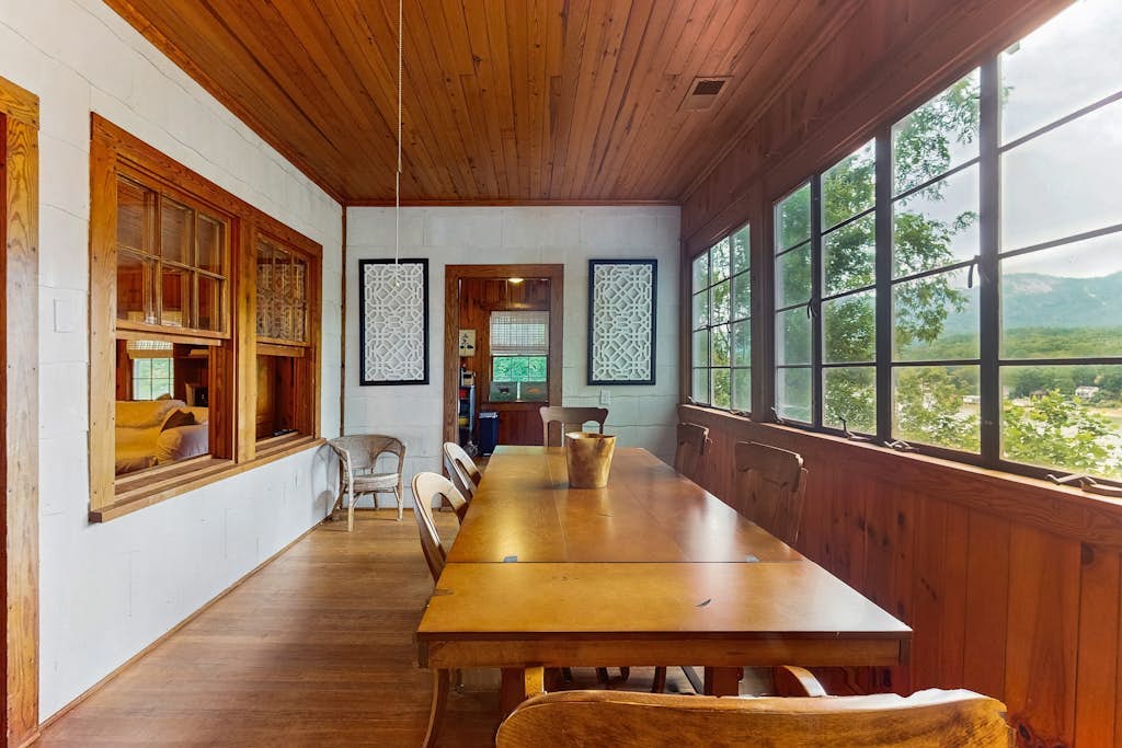 Lakefront cabin at Lake Lure with grill, boathouse, dock & porch