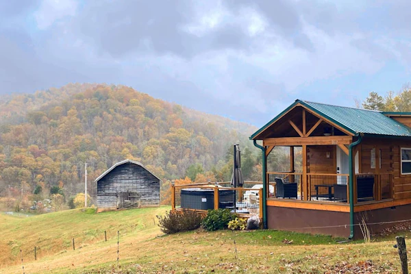 2 Tiny home cabins with private hot tubs, covered porches, & amazing views