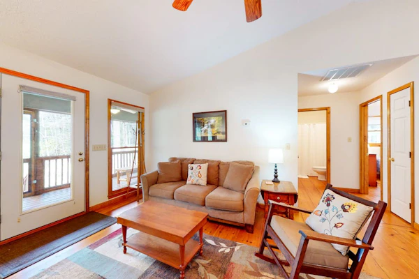Mountainside abode with a wood stove, firepit, grill, sunroom, AC, and W/D