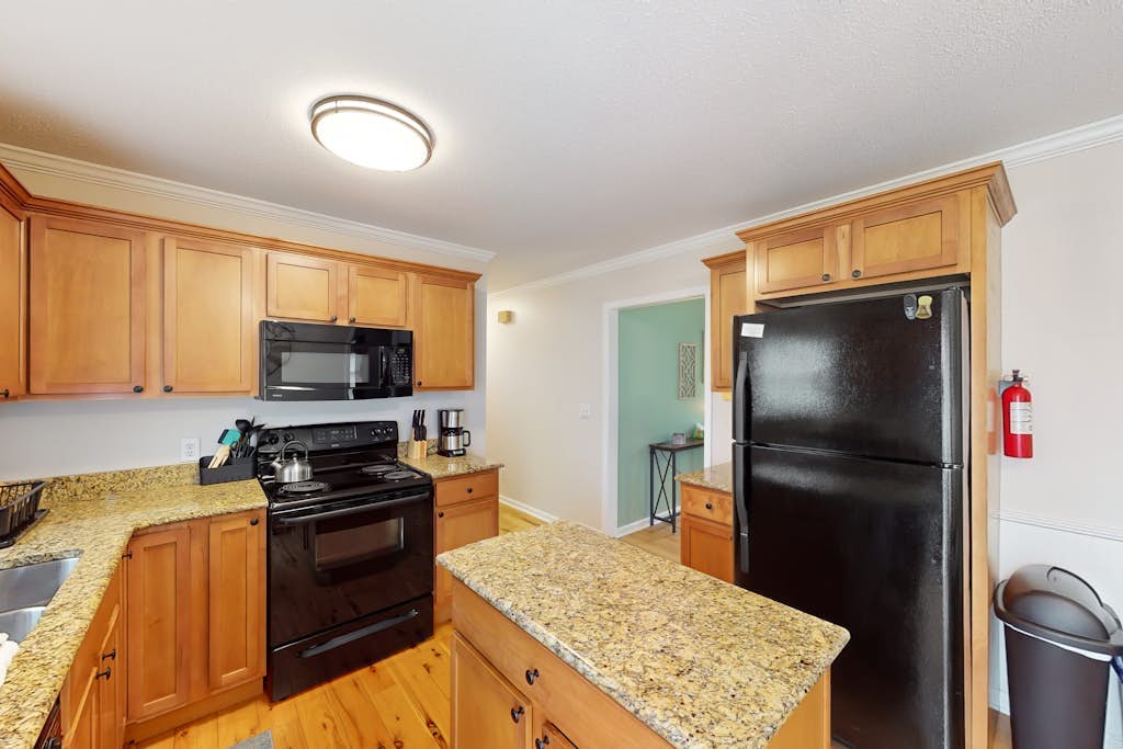 Well-located home in town with sunrise views, deck & great backyard