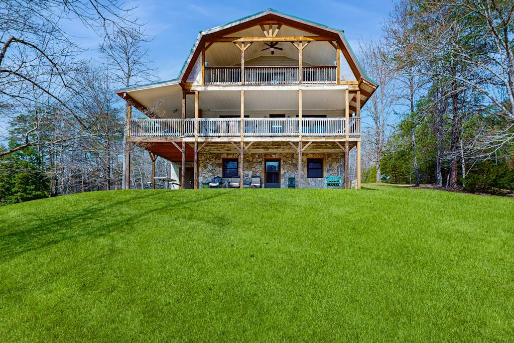 Dog-friendly lake front home with private dock and mountain views
