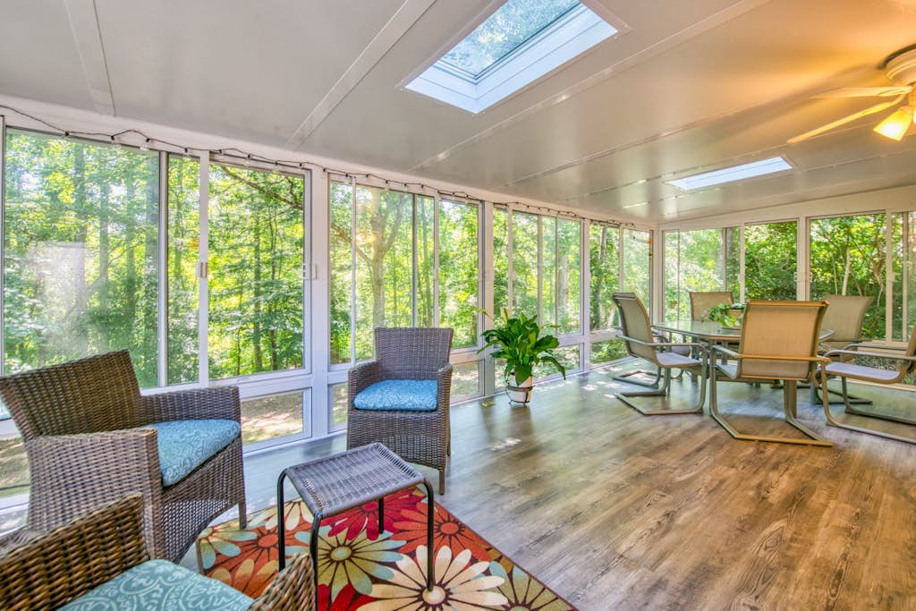 Dog-friendly home with large yard, lawn games, firepit, screened porch, & AC