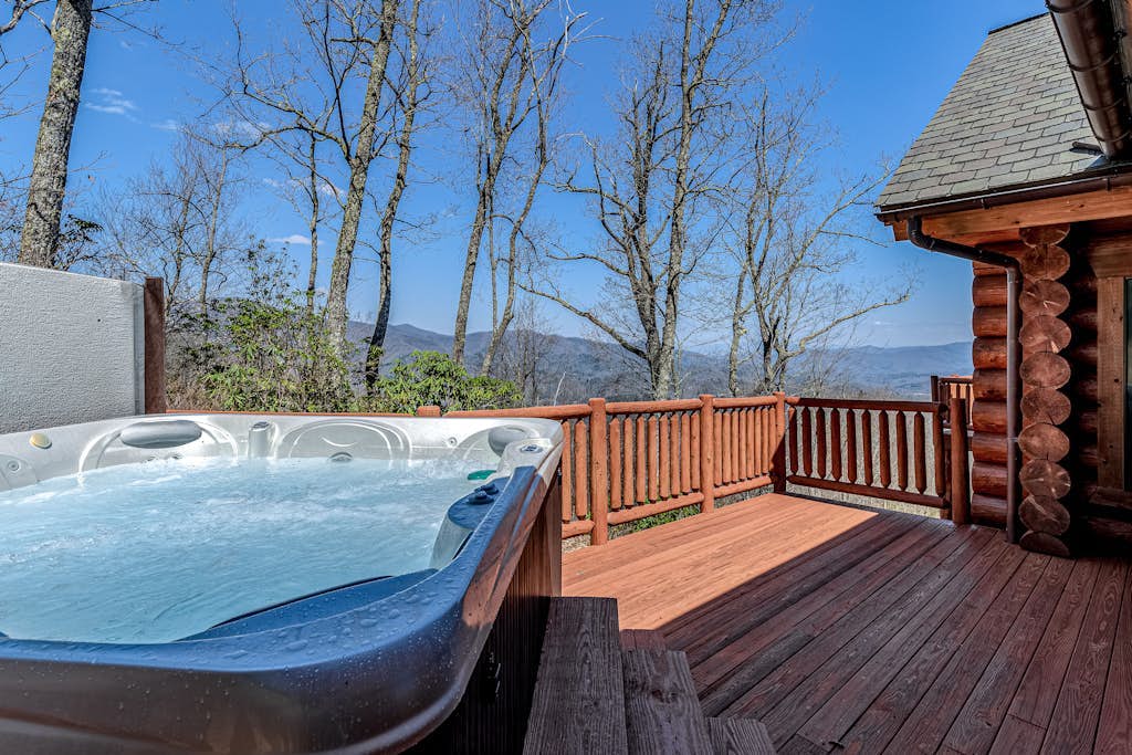 Mountain-view log home with hot tub, firepits, pool table & air hockey