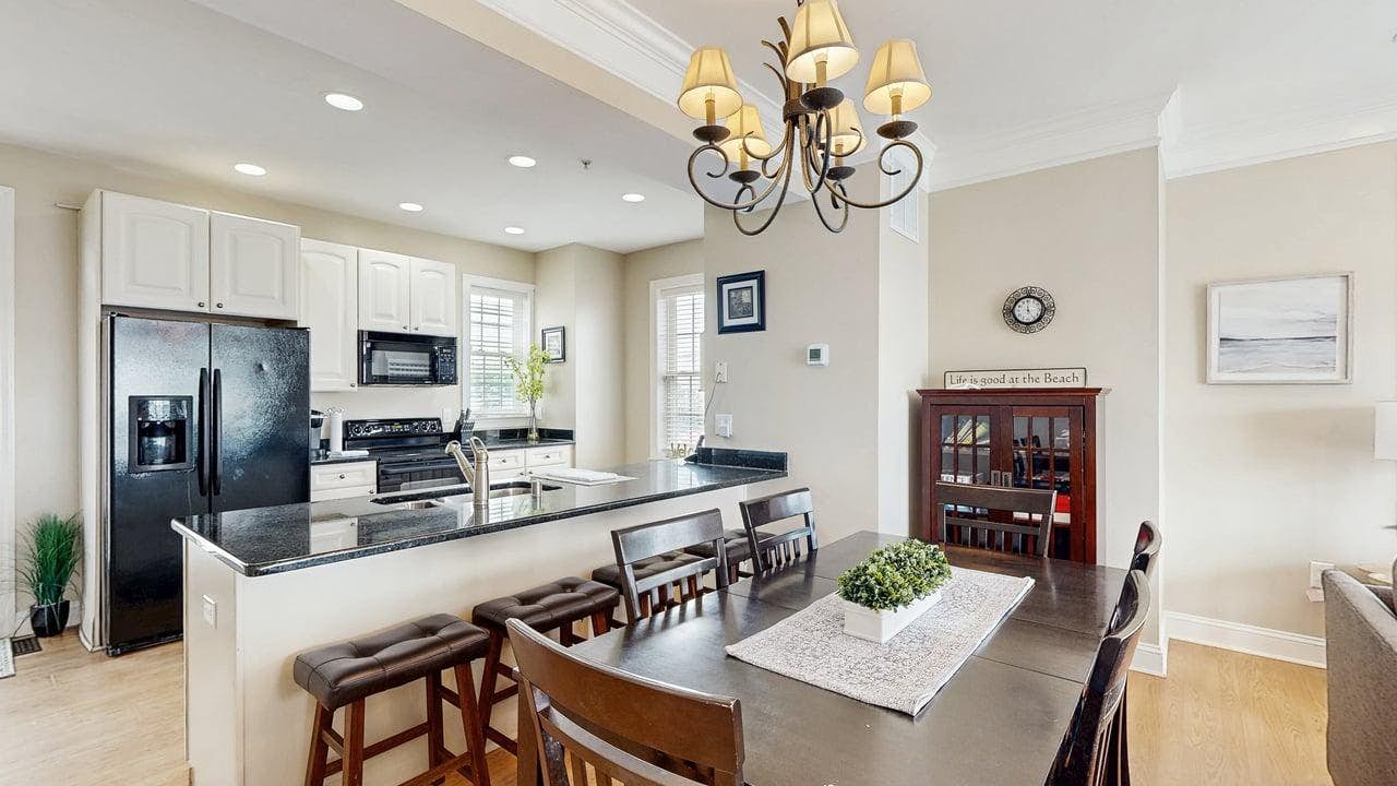 Spacious coastal townhouse with multiple decks, gas fireplace, & relaxing Bay views