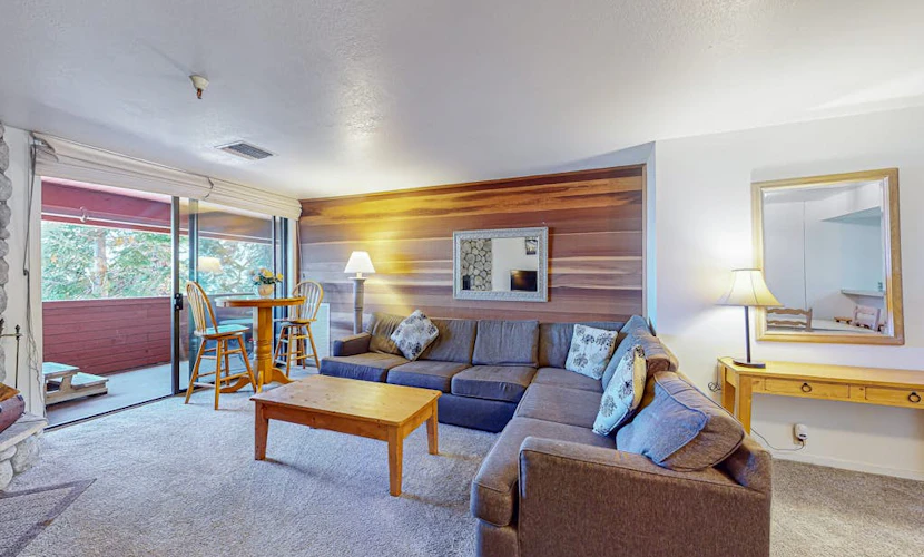 Ski-in/out condo with mountain view, private hot tub, deck & fireplace