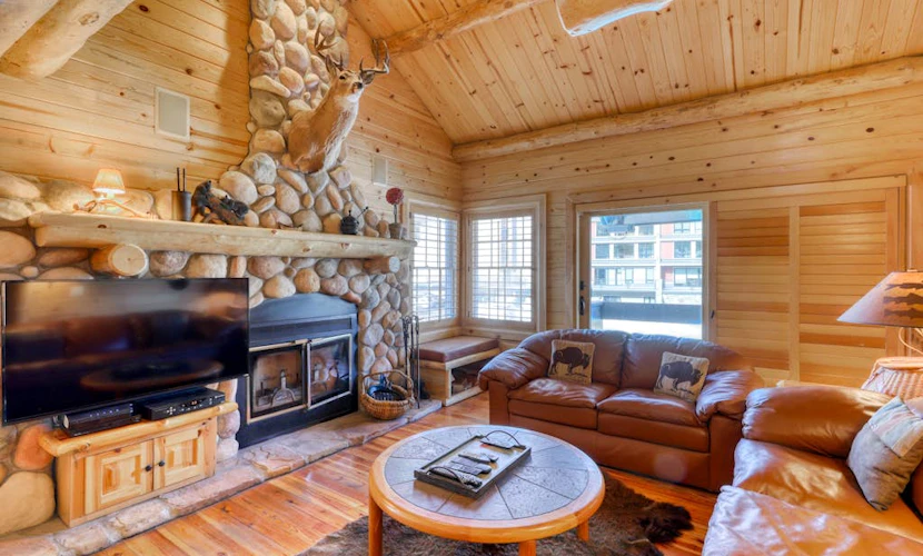 Luxurious condo with a fireplace & shared washer/dryer, pool, hot tub, & sauna