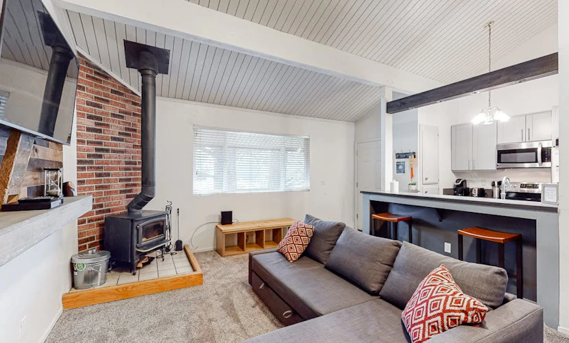 Charming, two-story ski condo w/ a wood stove, free WiFi, shared pool, & hot tub